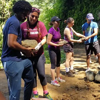 Students Moving Rocks